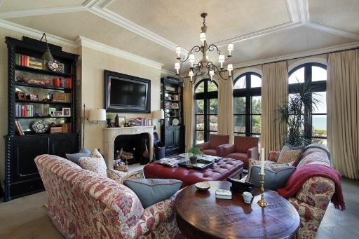 175 Sheridan Road Winnetka, IL 60093 - Photo 7 of 16 a living room with furniture a fireplace and a flat screen tv