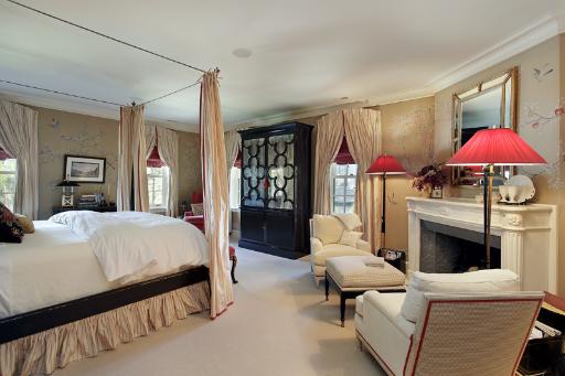 175 Sheridan Road Winnetka, IL 60093 - Photo 10 of 16 a bed room with a bed and a fireplace