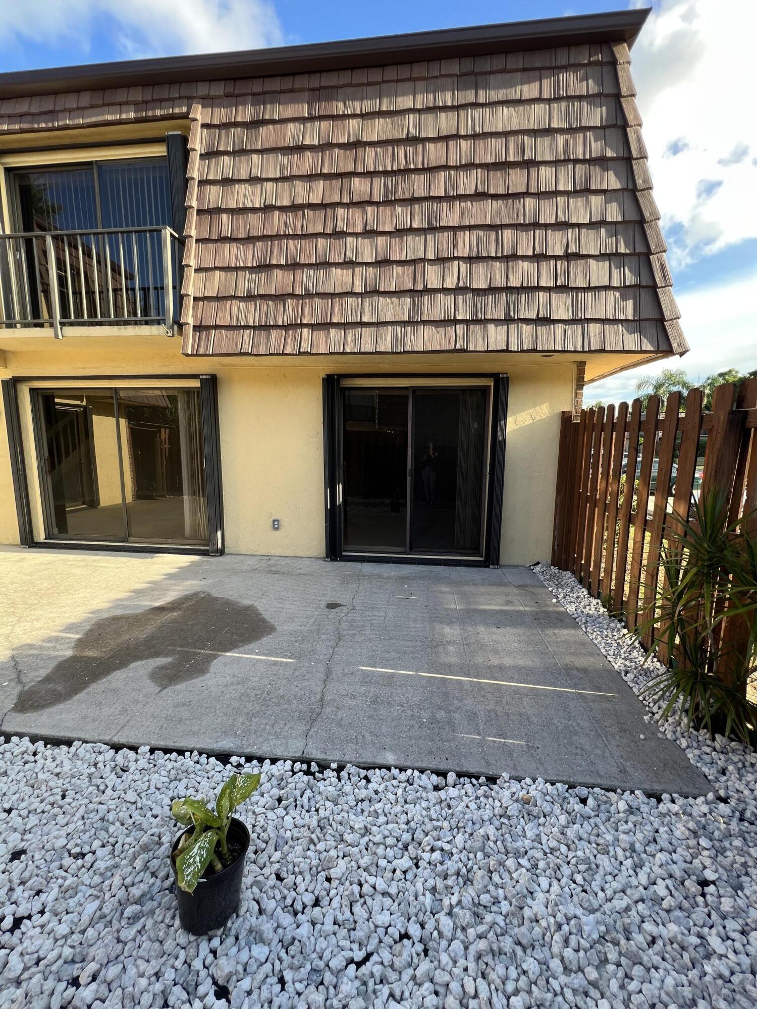 731 Springdale Circle Palm Springs, FL 33461 - Photo 4 of 20 a front view of a house