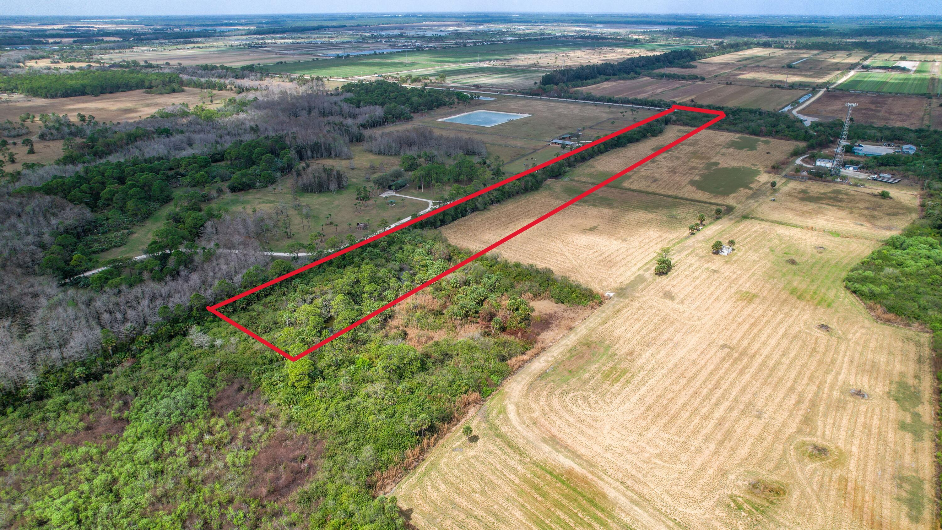 0 Southeast Bridge Road Hobe Sound, FL 33455 - Photo 8 of 9 a view of an outdoor space and a lake view