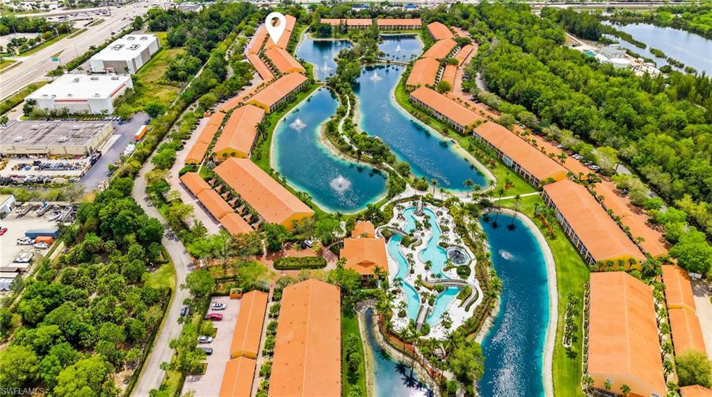 6840 Beach Resort Drive, Unit 16 Naples, FL 34114 - Photo 41 of 49 Bird's eye view of a nearby body of water