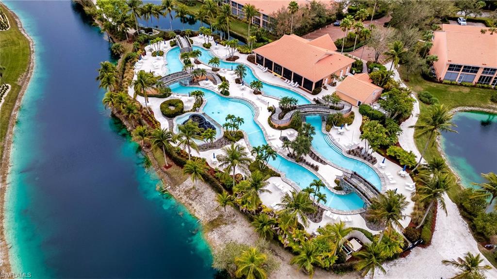 6840 Beach Resort Drive, Unit 16 Naples, FL 34114 - Photo 45 of 49 Aerial view of a nearby body of water and a pool