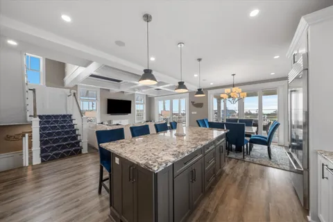 a kitchen with a table and chairs in it