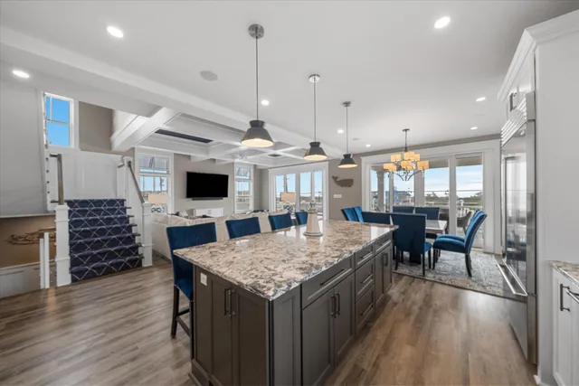 a kitchen with a table and chairs in it