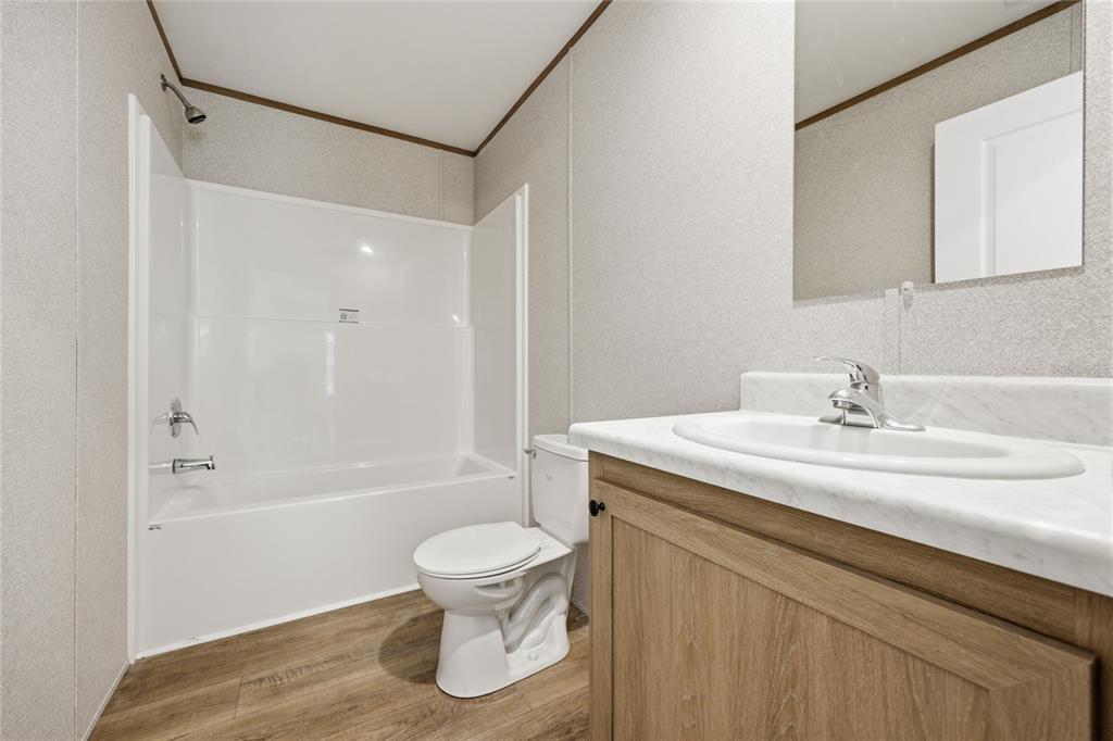 150 19th Street Interlachen, FL 32148 - Photo 26 of 30 a bathroom with a sink toilet and shower