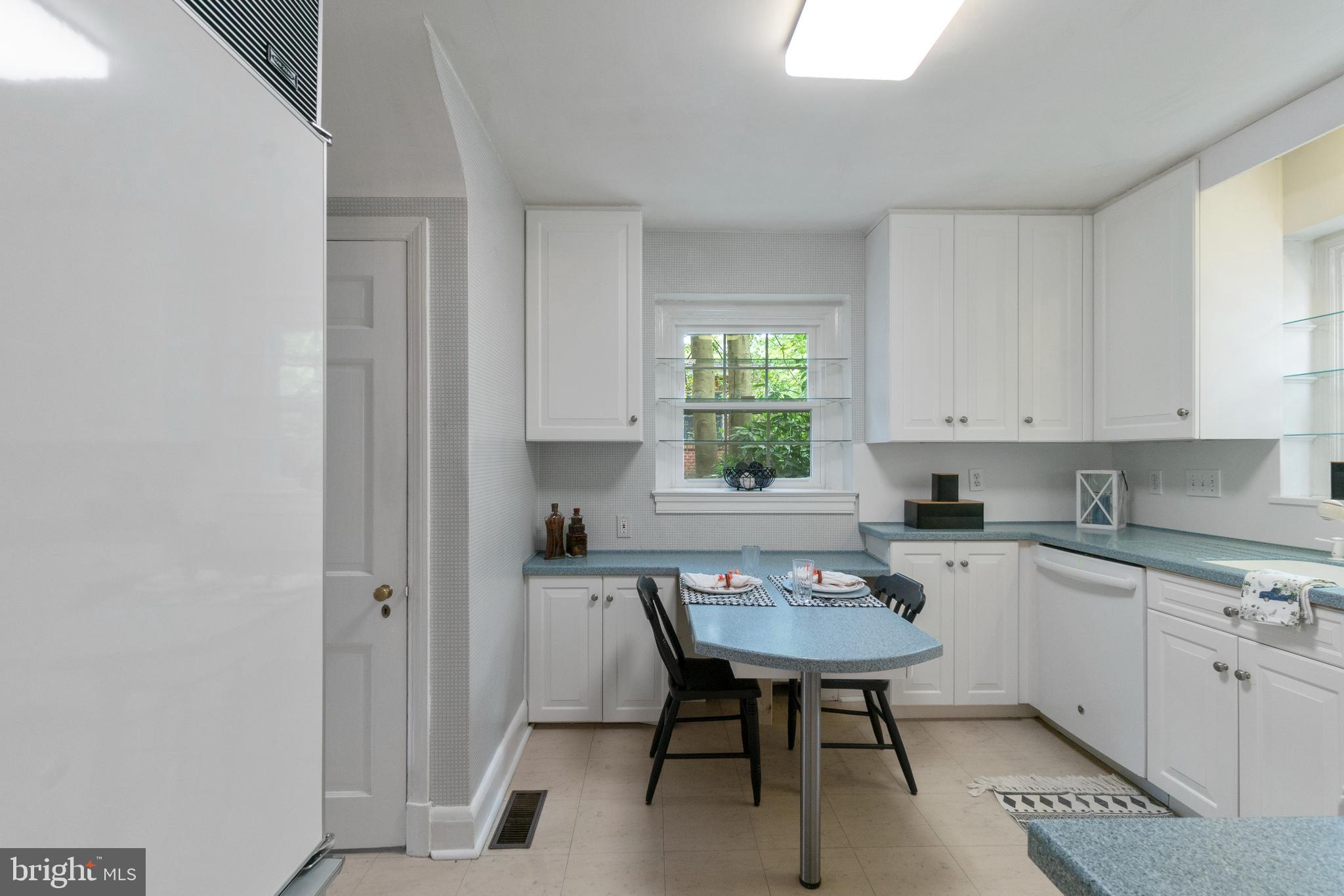 2110 South Road Baltimore, MD 21209 - Photo 25 of 43 White cabinets in eat in kitchen