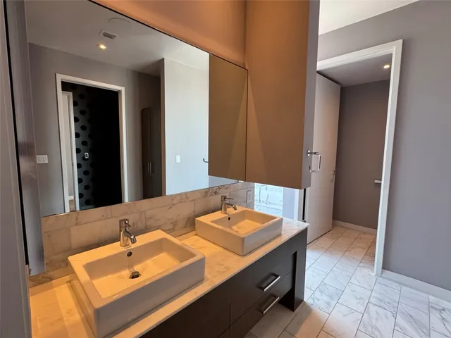a view of living room and kitchen with wooden floor