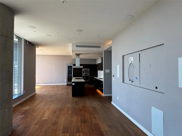 a kitchen with granite countertop a stove and a sink