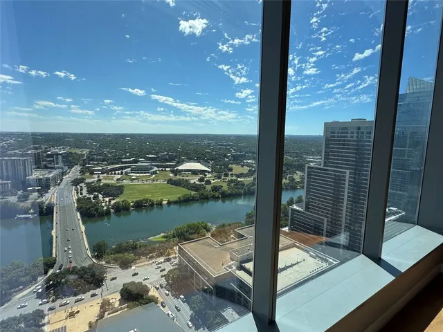 a view of a lake from a balcony