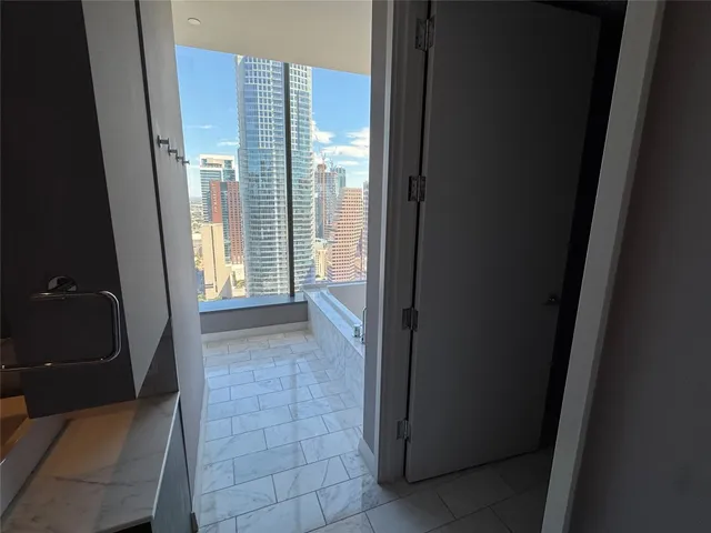 a bathroom with a toilet and a sink