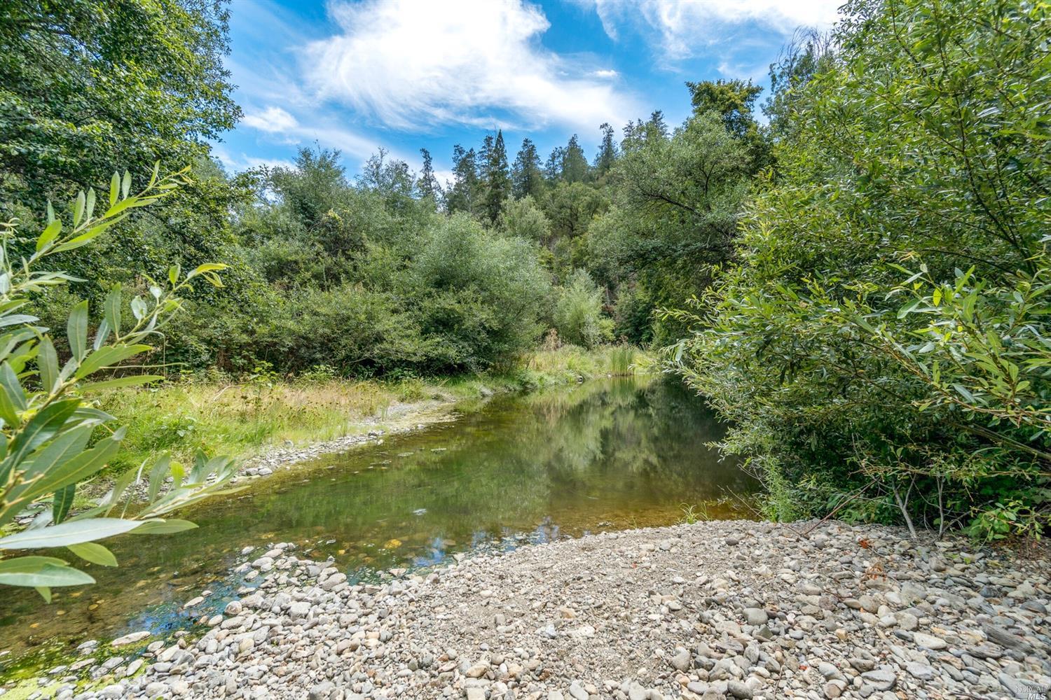 2614 Leslie Road Santa Rosa, CA 95404 - Photo 1 of 1 a view of a lake from a yard