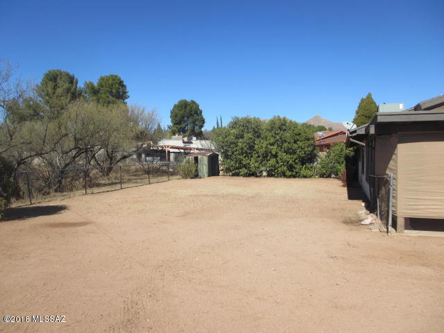 1160 Avenida Leon Rio Rico, AZ 85648 - Photo 37 of 47 a view of a house with a yard