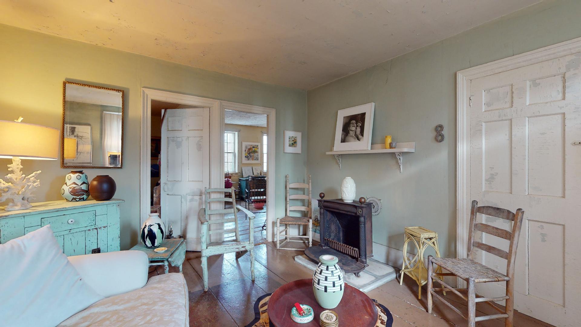 580 Commercial Street Provincetown, MA 02657 - Photo 11 of 58 a living room with furniture and wooden floor