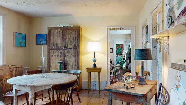 a view of a dining room with furniture