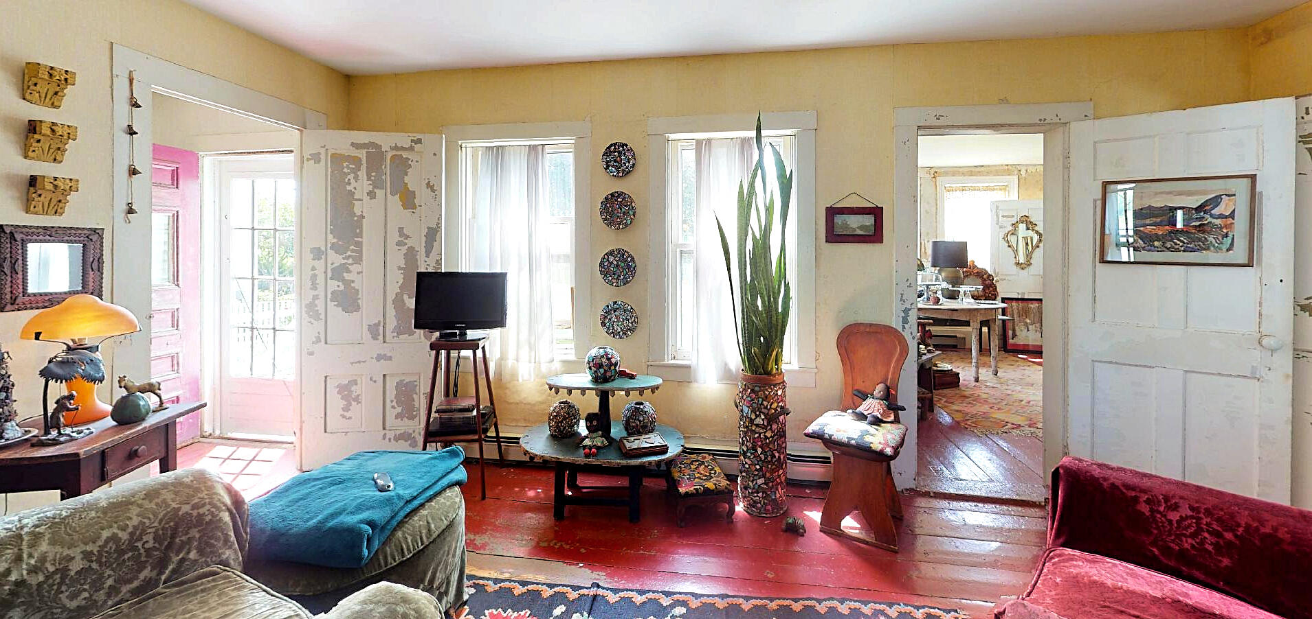 580 Commercial Street Provincetown, MA 02657 - Photo 33 of 58 a living room with furniture and a flat screen tv