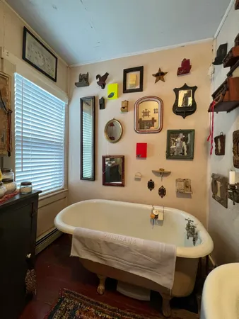 a room with a window and a table
