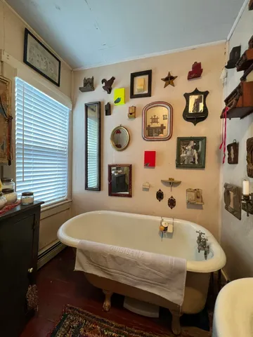 a room with a window and a table