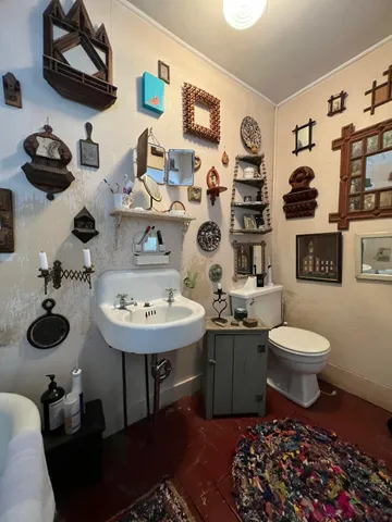 a view of a dining area with furniture and chandelier