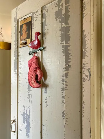 a utility room with lots of wooden furniture