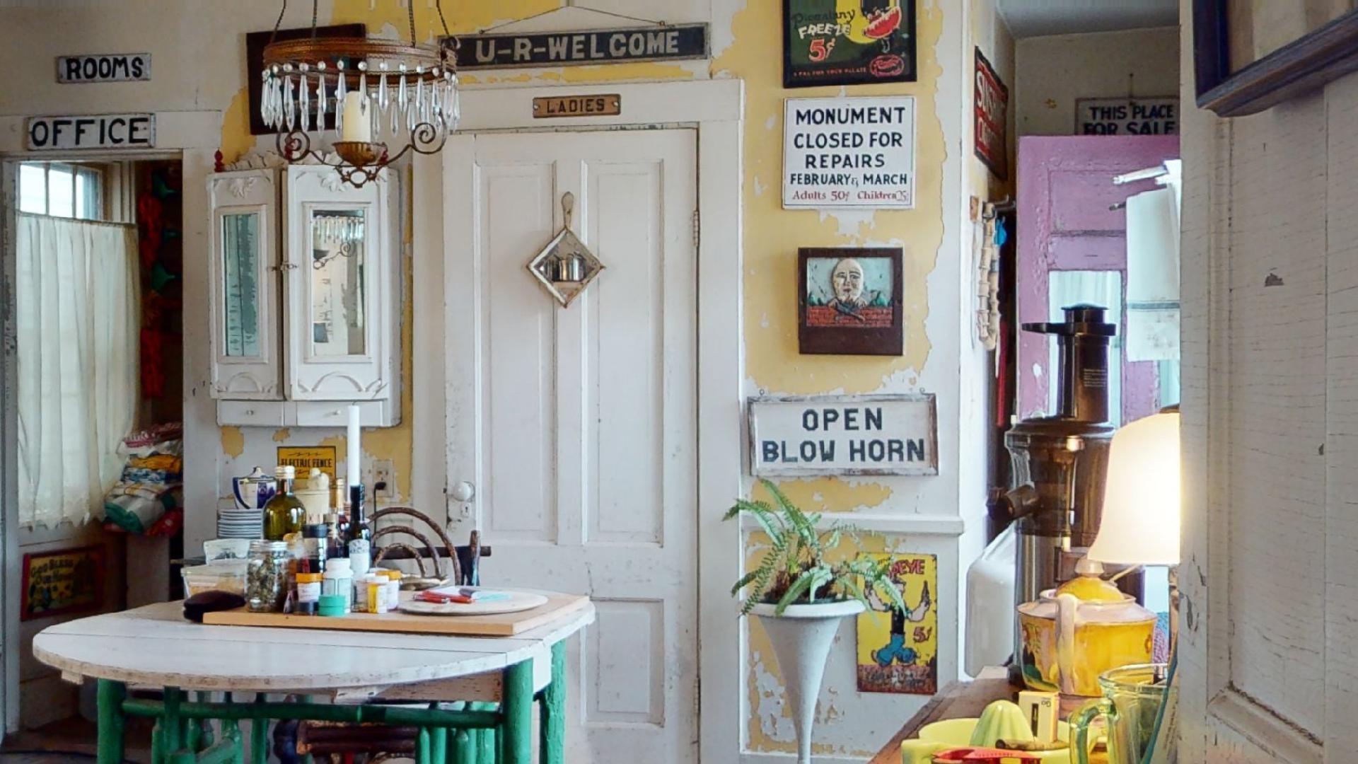 580 Commercial Street Provincetown, MA 02657 - Photo 38 of 58 a view of a dining area with furniture and chandelier