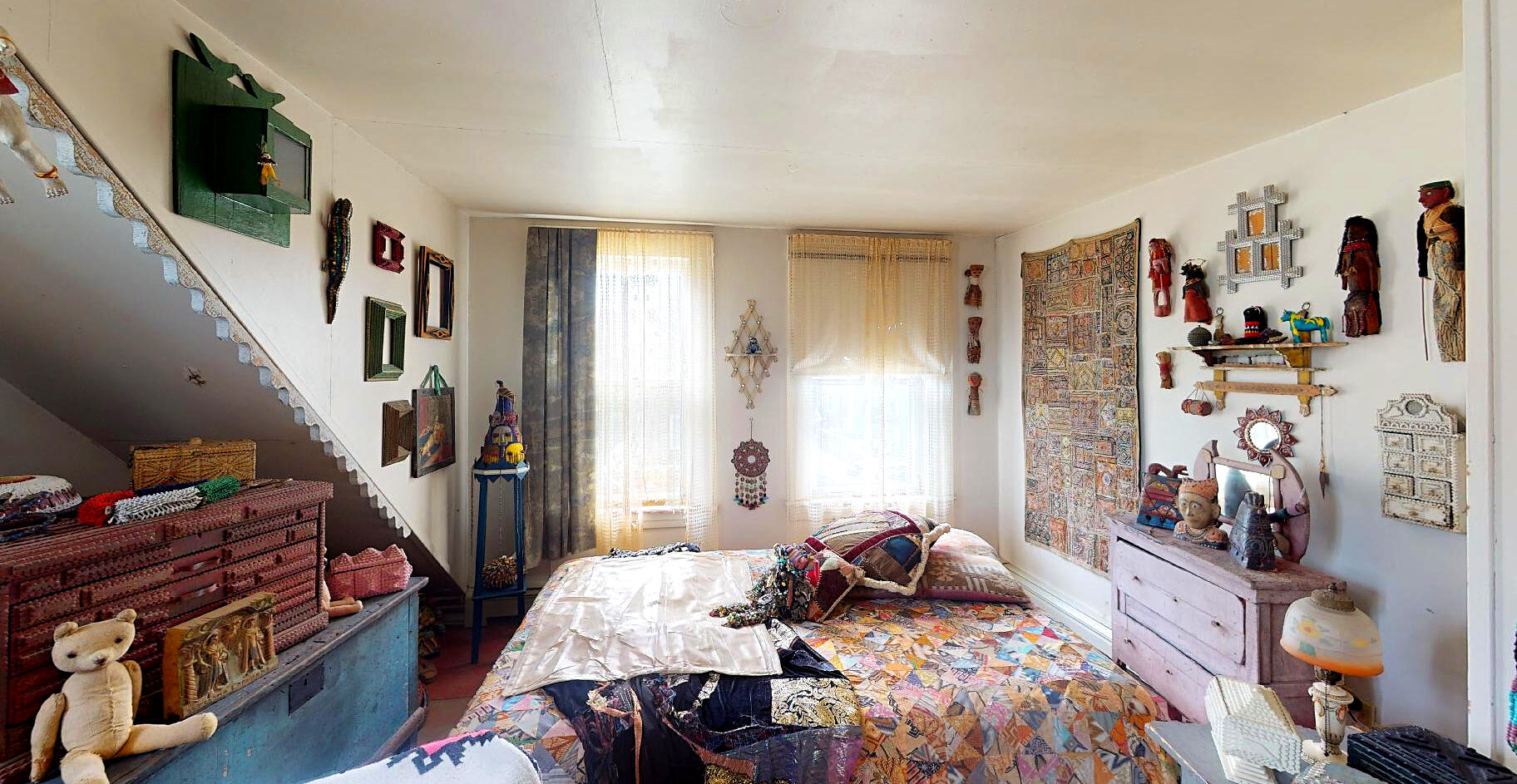 580 Commercial Street Provincetown, MA 02657 - Photo 48 of 58 a bed room with a bed and a couch