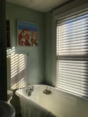 a view of house with garden space and trees