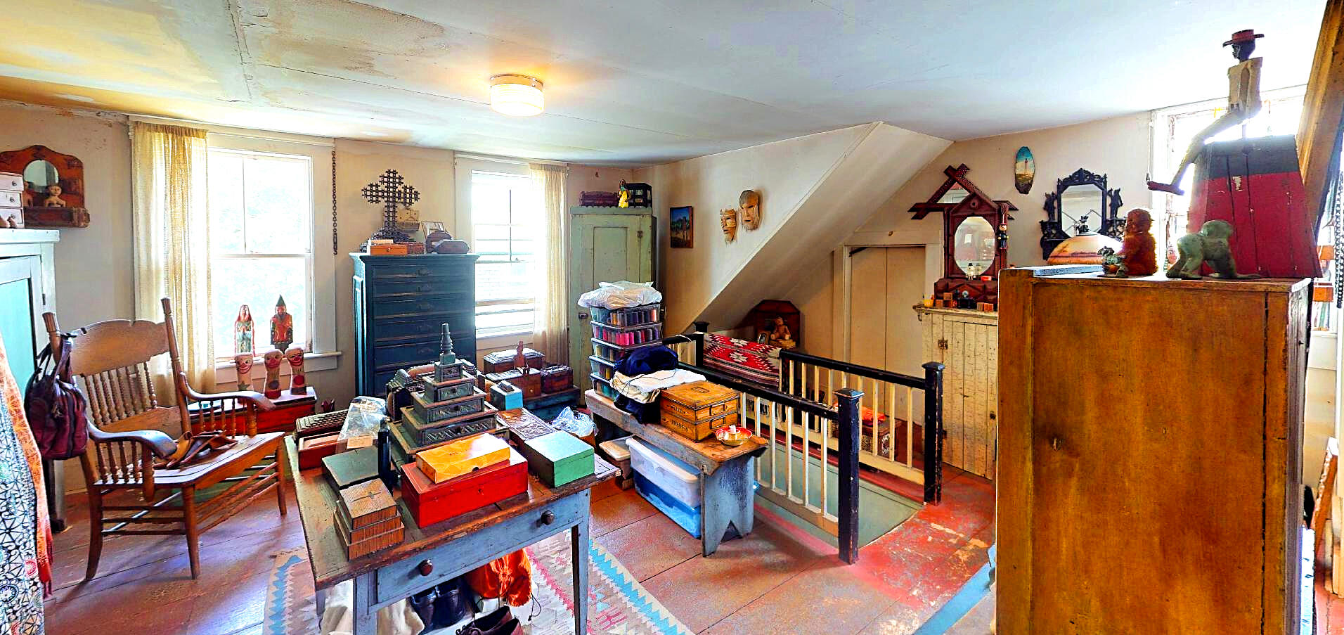 580 Commercial Street Provincetown, MA 02657 - Photo 52 of 58 a very nice looking room with many windows and furniture