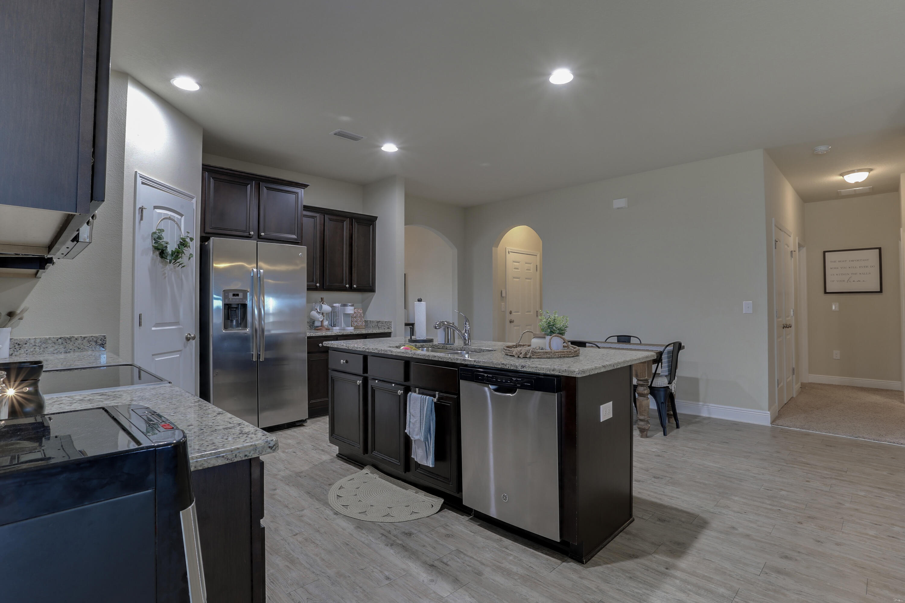 671 Teal Street Crestview, FL 32539 - Photo 18 of 41 a kitchen with stainless steel appliances a sink stove and refrigerator