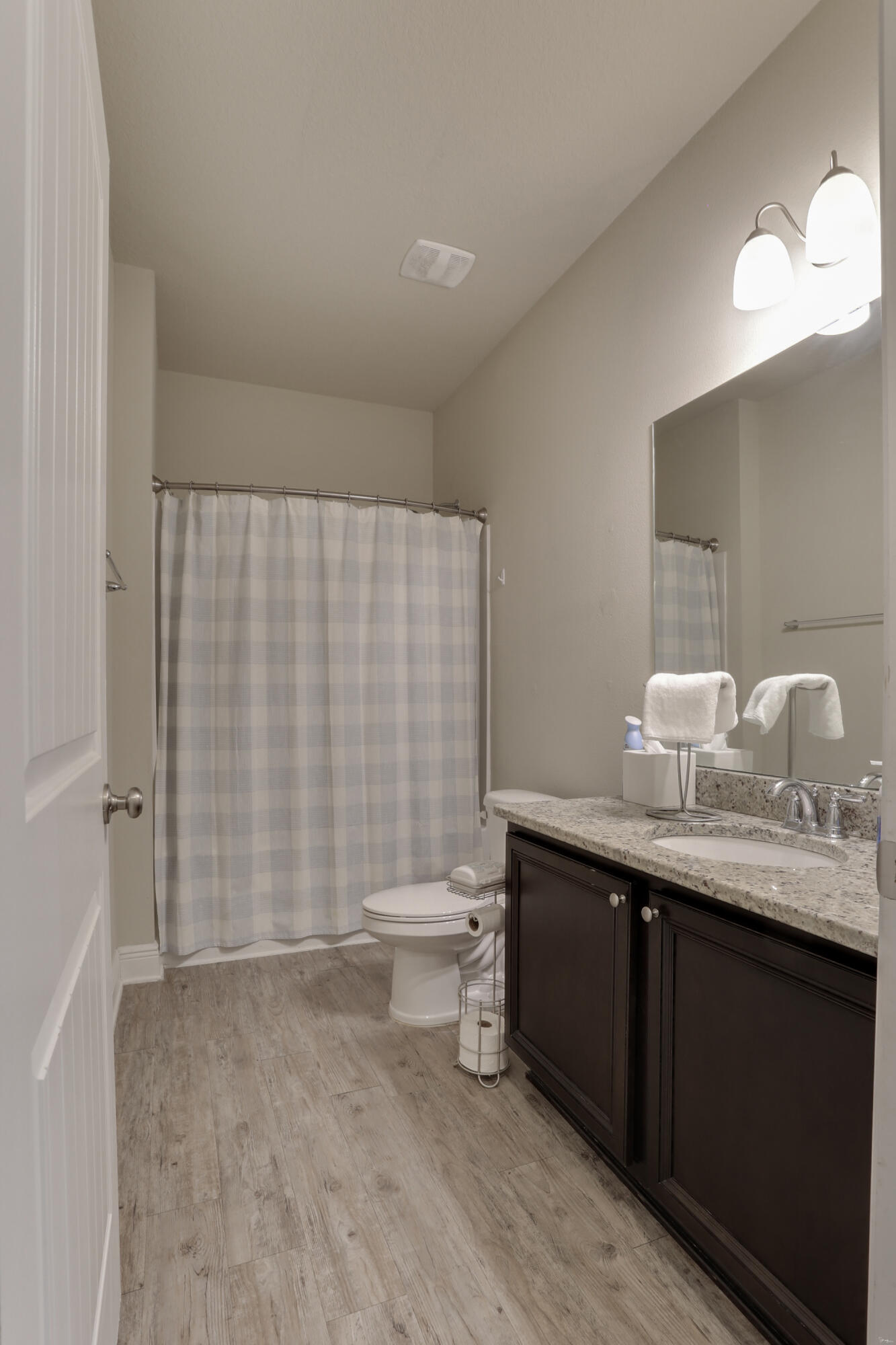671 Teal Street Crestview, FL 32539 - Photo 20 of 41 a bathroom with a double vanity sink toilet and a mirror