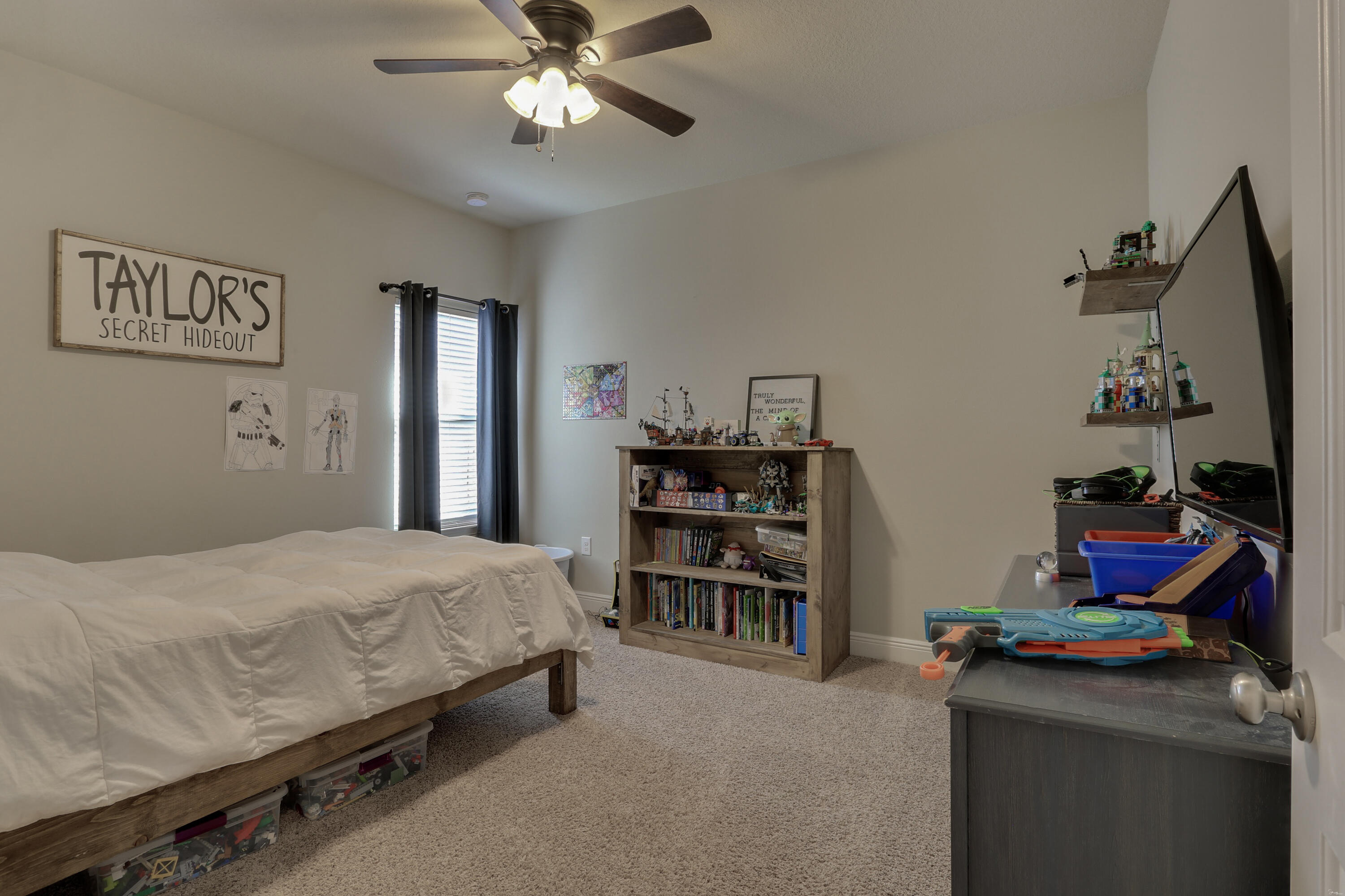 671 Teal Street Crestview, FL 32539 - Photo 21 of 41 a bedroom with a bed and furniture