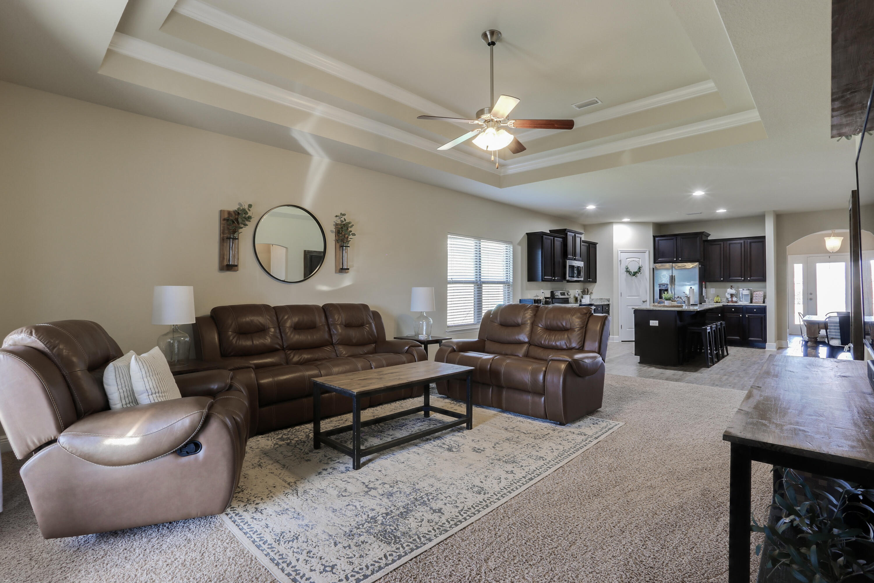 671 Teal Street Crestview, FL 32539 - Photo 25 of 41 a living room with furniture and kitchen view