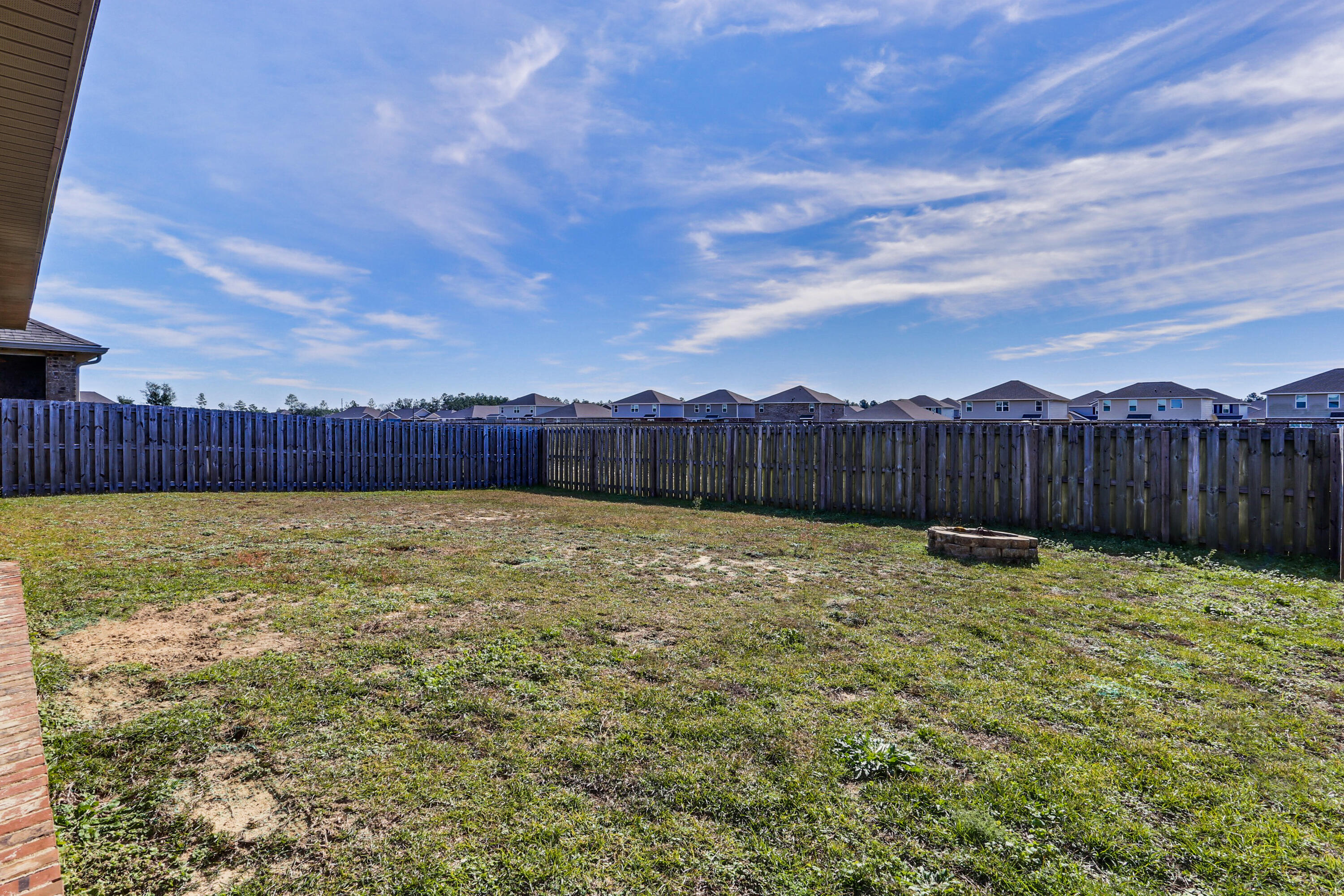 671 Teal Street Crestview, FL 32539 - Photo 38 of 41 a view of an outdoor space with wooden fence
