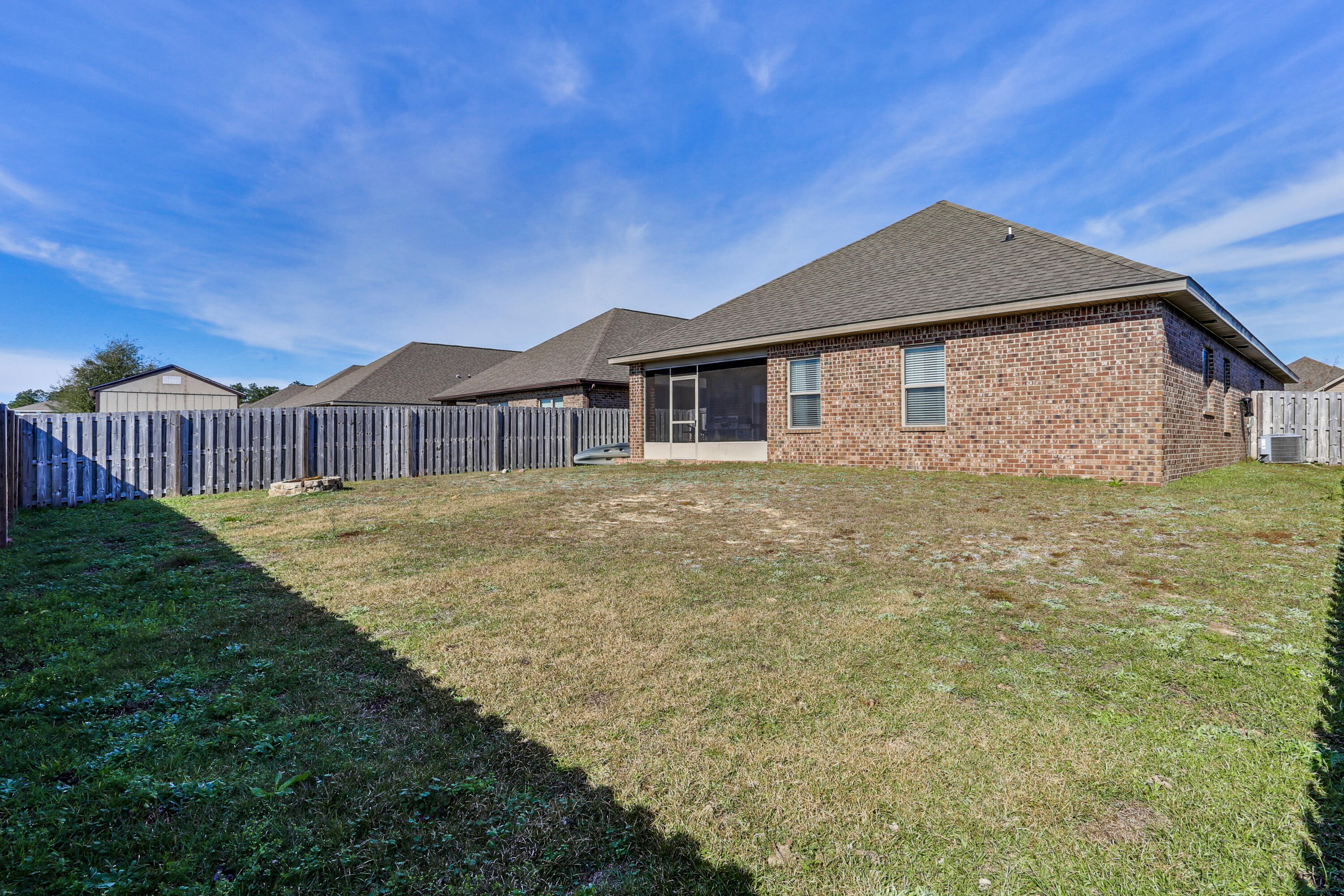671 Teal Street Crestview, FL 32539 - Photo 40 of 41 a front view of a house with garden