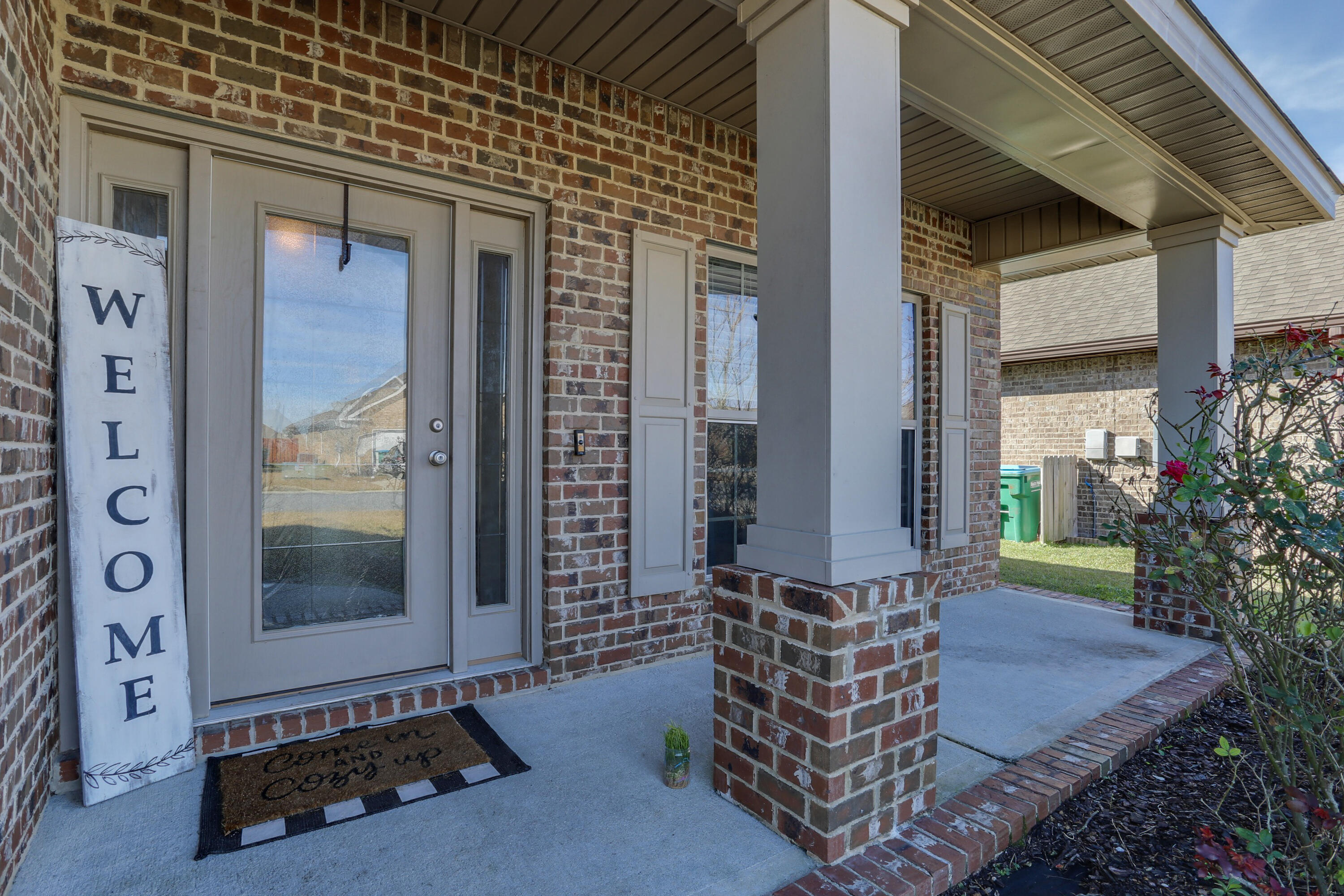 671 Teal Street Crestview, FL 32539 - Photo 4 of 41 a front view of a house with a yard