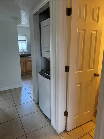 a kitchen with a refrigerator
