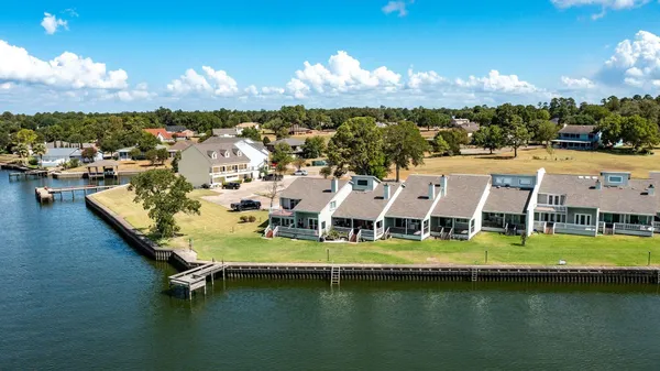 a view of swimming pool with outdoor seating