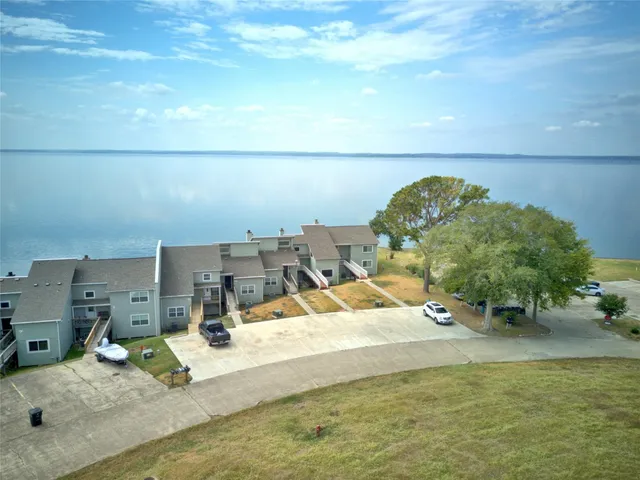 a view of a pool table and chairs in the patio