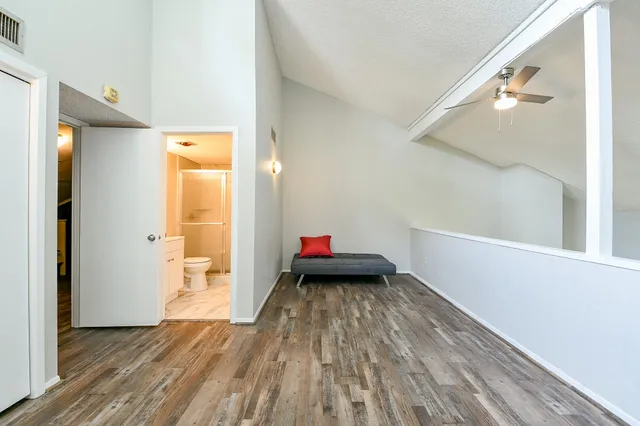a view of livingroom with furniture and wooden floor