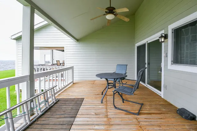 a view of a patio with a yard
