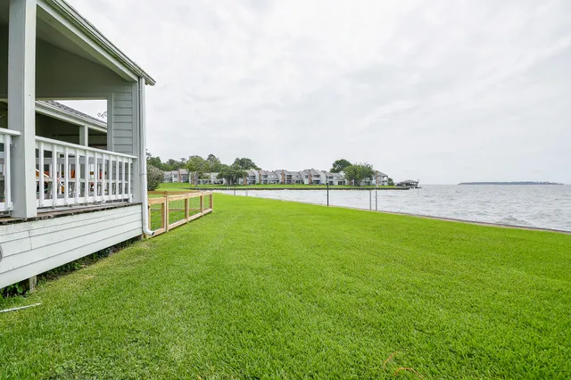a front view of a building with garden
