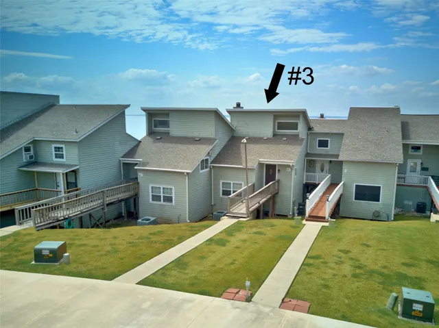 a front view of a house with swimming pool