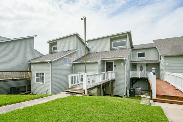 a house view with a garden space