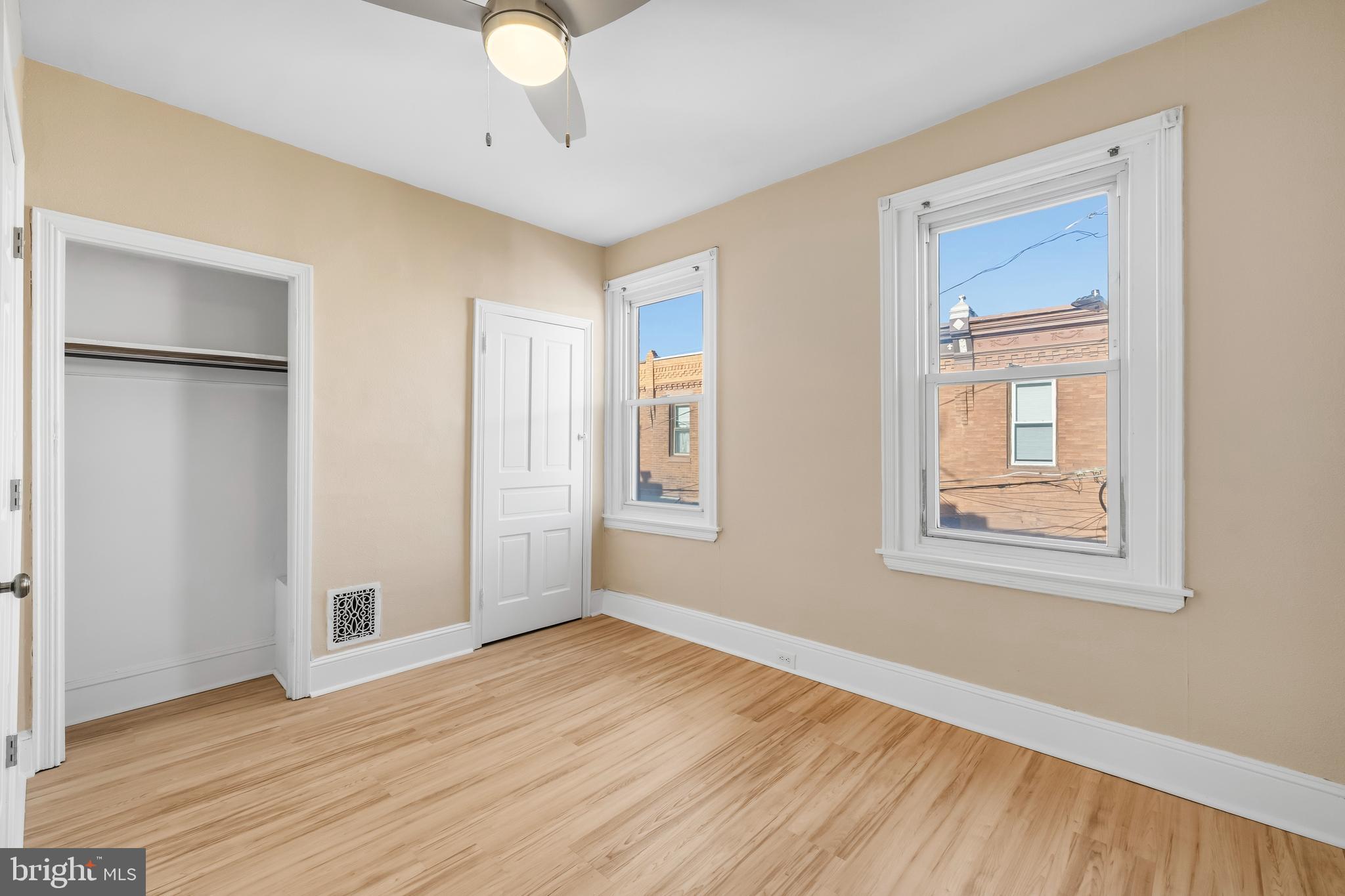 3061 Livingston Street Philadelphia, PA 19134 - Photo 11 of 28 a view of an empty room with wooden floor and a window