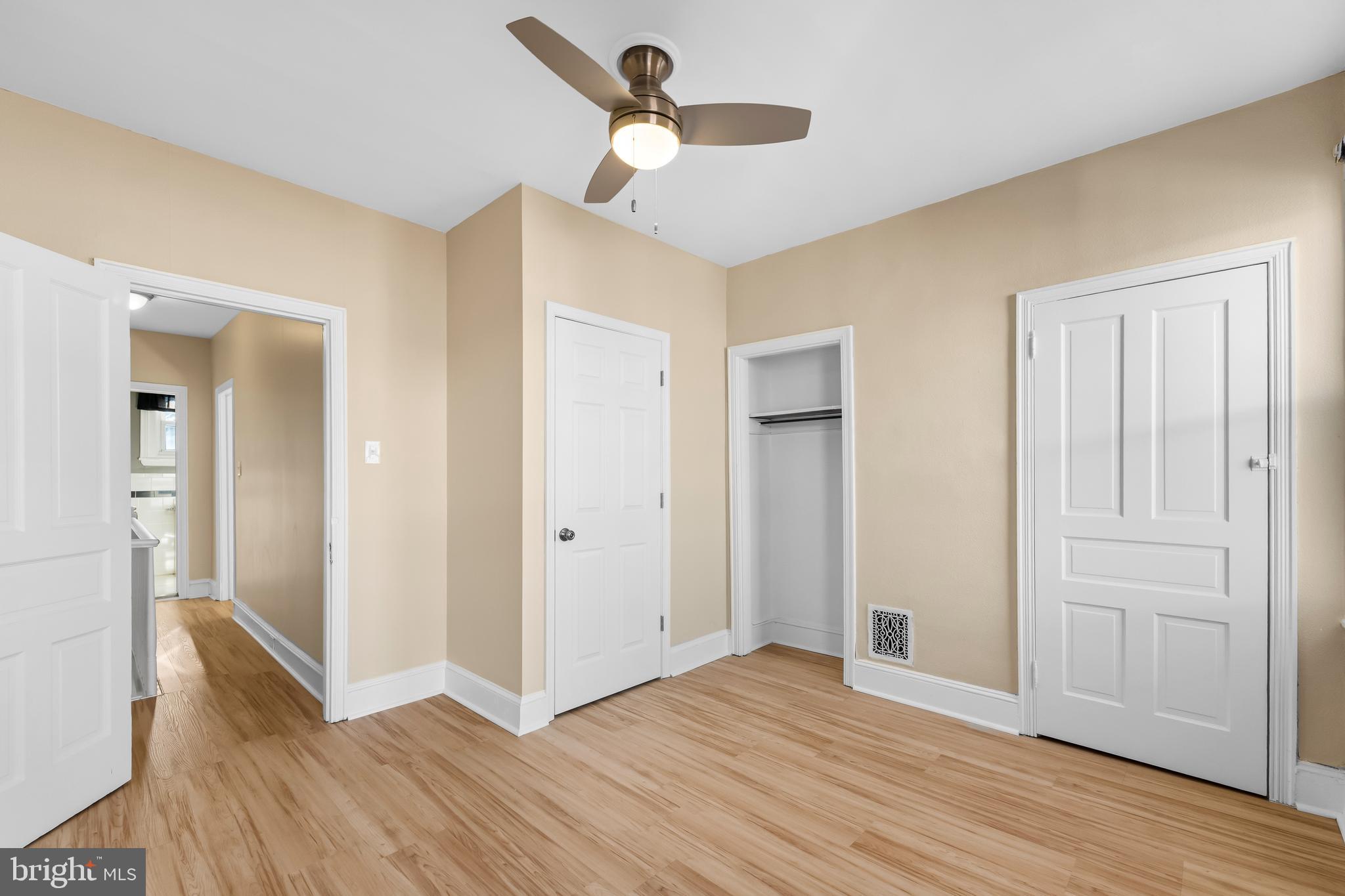 3061 Livingston Street Philadelphia, PA 19134 - Photo 12 of 28 wooden floor in an empty room with a window