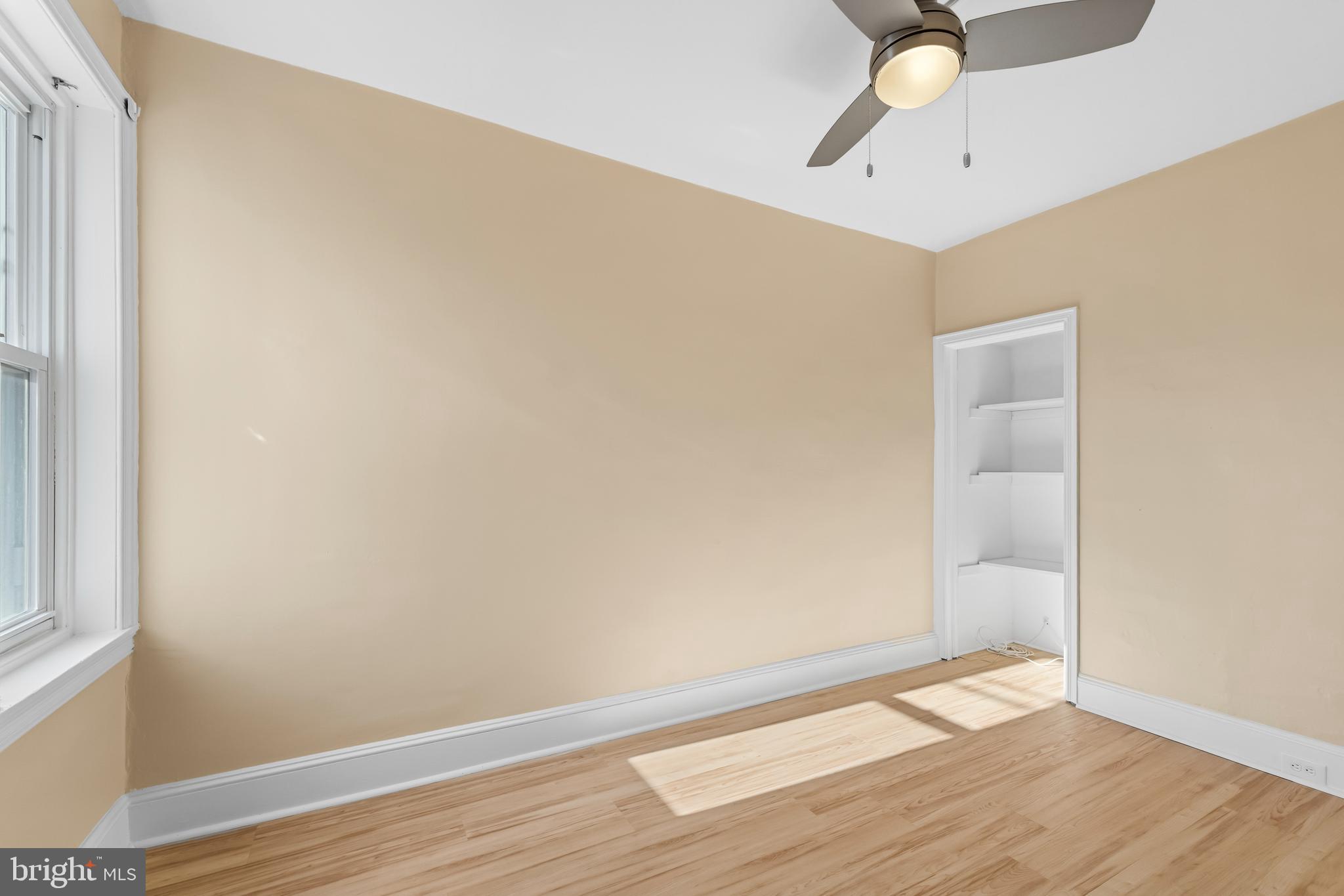 3061 Livingston Street Philadelphia, PA 19134 - Photo 13 of 28 a view of an empty room with wooden floor