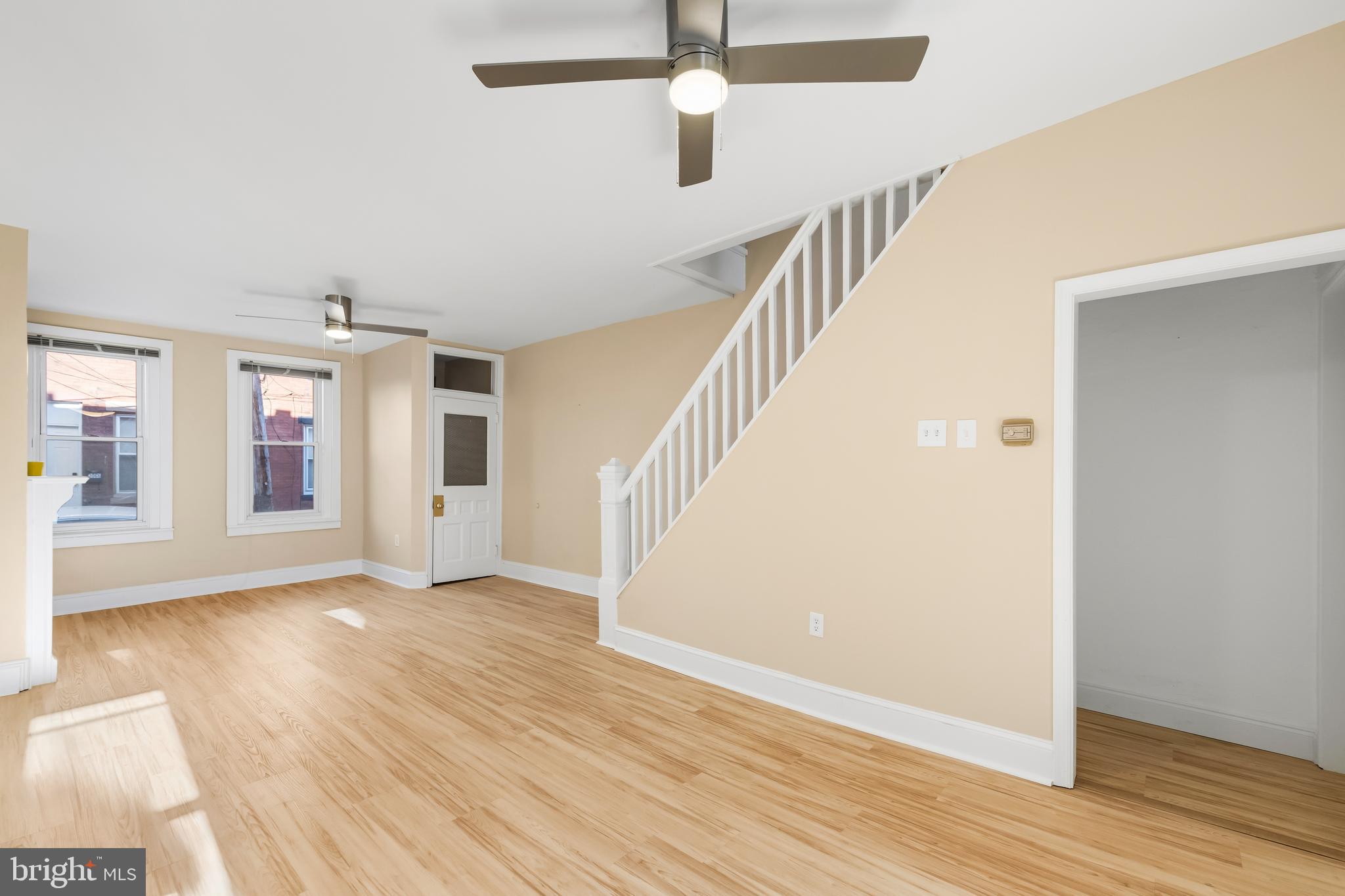 3061 Livingston Street Philadelphia, PA 19134 - Photo 4 of 28 a view of an empty room with wooden floor and a window