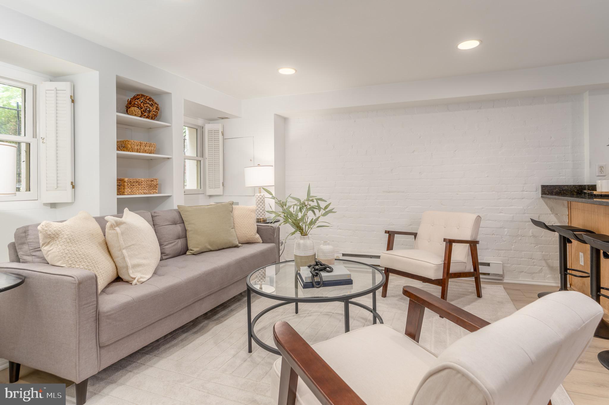1683 35th Street Northwest, Unit B Washington, DC 20007 - Photo 2 of 10 a living room with furniture