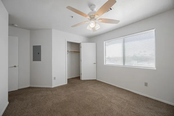 a view of an empty room with a window