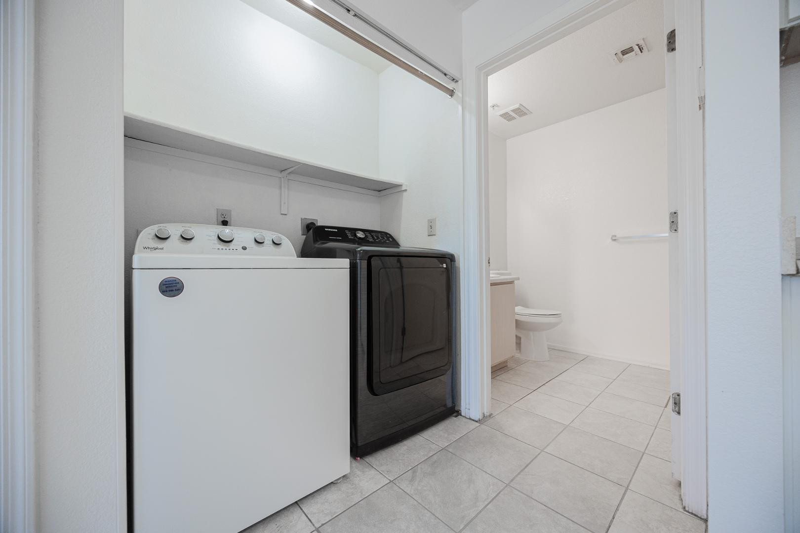 16033 North 25th Street, Unit 202 Phoenix, AZ 85032 - Photo 18 of 18 a utility room with dryer and washer