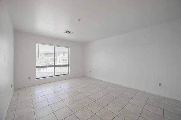 an empty room with windows